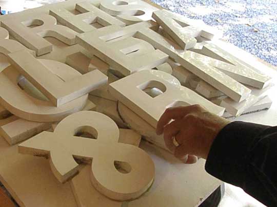 Hand-made letters by Paul Parpard ready for a custom-made sign