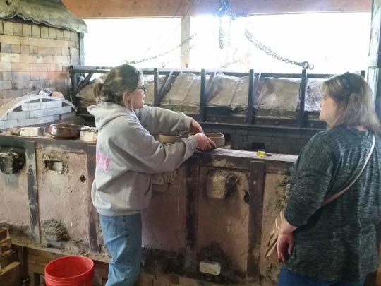 Liz Lurie discussing use of her wood kiln