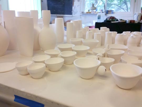Ceramic vessels awaiting glazes in the Beasecker/Lurie studio