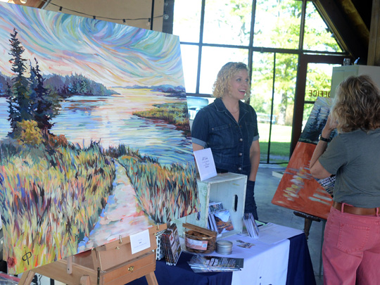 Jenna Paulsen and her paintings at Stone Quarry Art Park